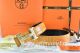 Hermes Reversible Belt Orange/Black Crocodile Stripe Leather With18K Gold Geometric Stripe H Buckle